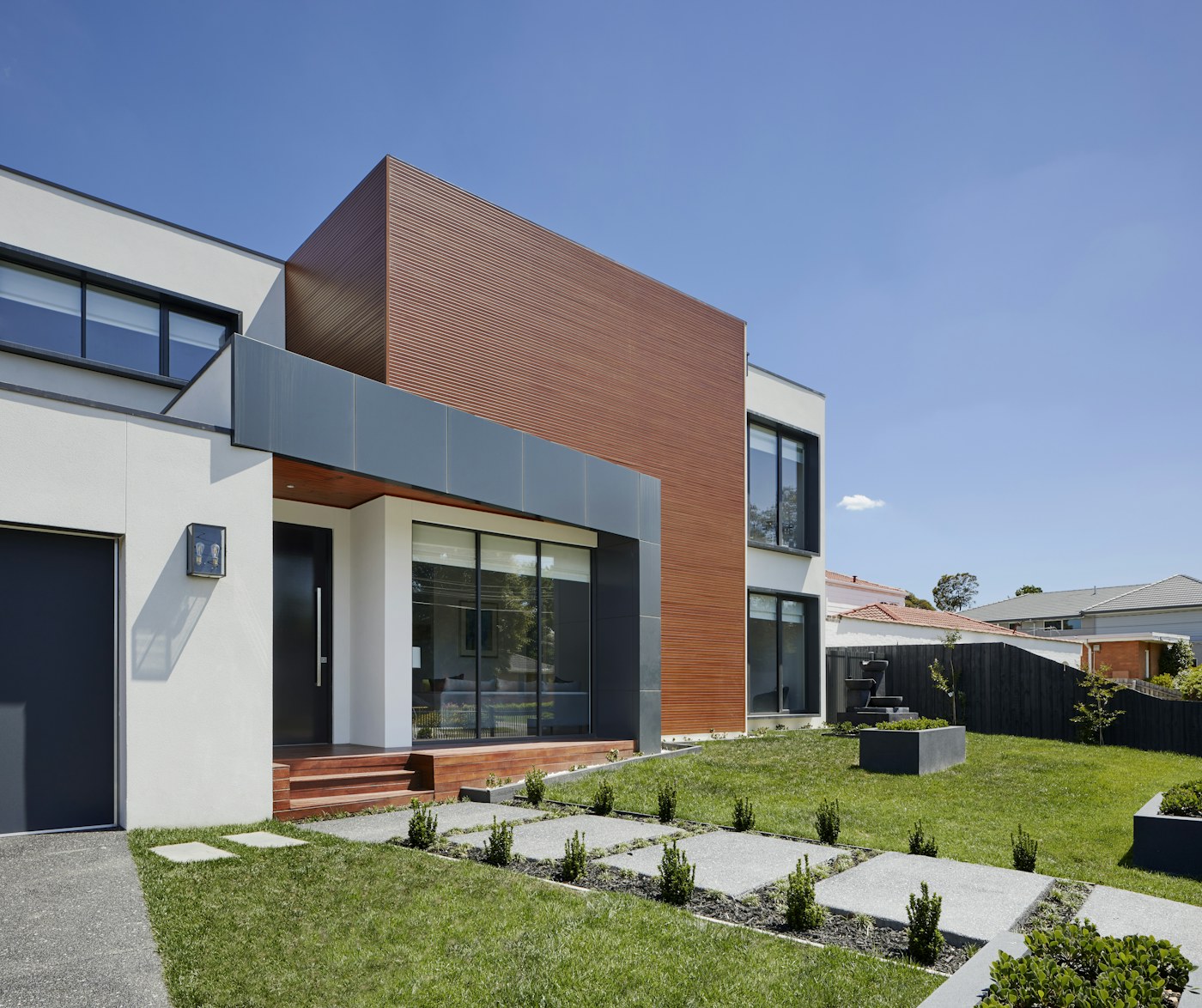 Modern suburban home with charcoal garage door, Pleasanton same-day repair